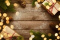 Christmas border with vintage gifts and decoration on old wooden background. Royalty Free Stock Photo