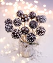 Christmas dessert,  cake pops with chocolate topping and silver white sprinkles Royalty Free Stock Photo