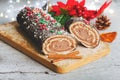 Christmas dessert concept. Christmas Chocolate yule log with Christmas decoration Royalty Free Stock Photo