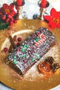 Christmas dessert concept. Christmas Chocolate yule log with Christmas decoration Royalty Free Stock Photo