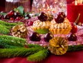 Christmas dessert - cupcakes with red cherries