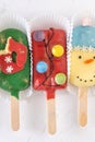 Christmas dessert. Sweet food. Cheesecake on a stick in the shape of ice cream. Children's treat in winter. Candy Royalty Free Stock Photo