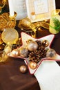 Christmas dinner background, plate, fork, knife and festive decoration on dark rustic wooden table, top view. Table setting with Royalty Free Stock Photo