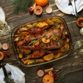 Christmas dinner with duck and fruit, festive table setting, New Year. Flat-lay