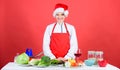 Christmas dinner ideas. Woman chef cooking christmas dinner wear santa hat. Festive menu concept. Best christmas recipes Royalty Free Stock Photo