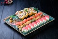 Christmas dinner at a Japanese restaurant, sushi rolls served, Chinese New Year Royalty Free Stock Photo