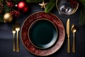 Christmas dinner meal table setting with a blank plate and Christmas decorations Royalty Free Stock Photo