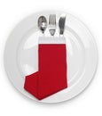 Christmas dinner, napkin folded as a santa claus boots Royalty Free Stock Photo