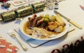 Christmas dinner plate roast turkey parsnips potatoes sprouts stuffing and gravy