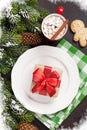 Christmas dinner plate, silverware, fir tree, gift Royalty Free Stock Photo