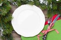 Christmas dinner plate, silverware, fir tree Royalty Free Stock Photo