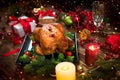 Christmas Dinner. Roasted chicken. Winter Holiday table served, decorated with candles and xmas baubles Royalty Free Stock Photo