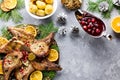 Christmas dinner with roasted meat steak, Christmas Wreath salad, baked potato, grilled vegetables, cranberry sauce