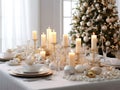 Christmas dinner setting in a light modern dining room. Winter holidays and celebration concept - table served for festive party Royalty Free Stock Photo