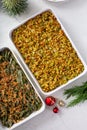 Christmas dinner side dishes including greean beans casserole and stuffing Royalty Free Stock Photo