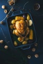 Christmas dinner table with chicken on dark Royalty Free Stock Photo