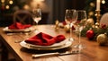Christmas Dinner Table Elegantly Set and Glowing with Warm Candlelight Royalty Free Stock Photo