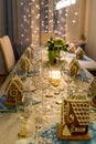 Christmas Dinner Table with Gingerbread Houses Place Cards