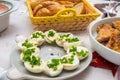 Christmas dinner table with traditional eggs mayonnaise