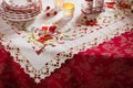 Christmas dishes, cutlery and decor in red and white