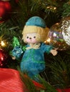 Christmas doll and decor in tree1 Royalty Free Stock Photo
