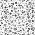 Christmas doodle snowflake, star, dots, falling snow seamless pattern. Black and white linear winter holiday background Royalty Free Stock Photo