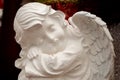 Christmas dreaming angel, close up. porcelain figurine of cupid