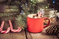 Christmas drink. Hot chocolate with marshmallows and candy cane on the wooden background. Hot cocoa with marshmallows. New Year. H Royalty Free Stock Photo