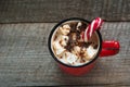 Christmas drink. Hot chocolate with marshmallows and candy cane on the wooden background. Hot cocoa with marshmallows. New Year. H Royalty Free Stock Photo