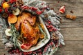 Christmas duck served with on wooden background. Christmas festive table. banner, menu, recipe place for text, top view Royalty Free Stock Photo