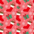 Red Sock With Candy Canes And Holly Leaves And Berries Ornate Seamless Pattern.