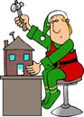 Christmas Elf building a Doll House Royalty Free Stock Photo