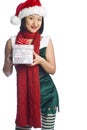 Christmas Elf Carrying Gift Royalty Free Stock Photo