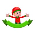 Christmas elf. Cute cartoon Santa Claus helper elf with vintage green ribbon for your text. Smiling little gnome in costume Royalty Free Stock Photo