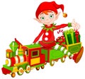 Christmas Elf and Toy Train Royalty Free Stock Photo