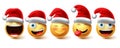 Christmas emoji vector set. Smiley xmas characters wearing santa red hat icon collection Royalty Free Stock Photo