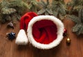 Christmas empty cap ornaments on a table in the snow with nice festive background Xmas illuminations