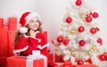 Christmas eve concept. Cherished holiday activity. Join christmas celebration. Kid decorating christmas tree. Child