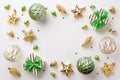 Christmas Eve concept. Top view photo of gift boxes with ribbon bows gold green transparent baubles star pine cone ornaments and