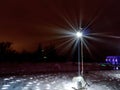 Christmas evening winter landscape with vintage lampposts Royalty Free Stock Photo