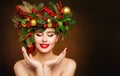 Christmas Face and Hand Skin Care. Xmas and New year Holiday Make-up and Hair Style. Girl looking to Product on open Hand