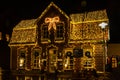 Christmas fair in the evening with lots of yellow colored christmas lights