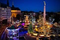 Christmas market. Winter fair with tree and lights. Royalty Free Stock Photo