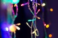 Christmas fairy lights, multi-colored fiber optics with bokeh. Royalty Free Stock Photo
