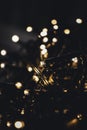 Christmas fairy lights wrapped around card at night Royalty Free Stock Photo