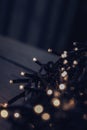 Christmas fairy lights wrapped around card at night Royalty Free Stock Photo