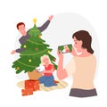 Christmas family fun time, mother holding phone to take photo of child unwrapping gift