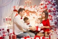 Christmas Family Open Present Gift Front of Xmas Tree, Happy Father Mother Children
