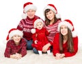 Christmas Family Portrait, Parents and Children in Red Santa Hats, Five Persons on White