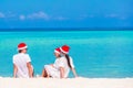 Christmas Family vacation on white beach Royalty Free Stock Photo